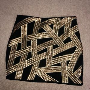 Gold glittery mini skirt